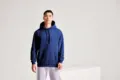 Anthem Studio Hoodie AM101 worn by a model