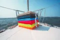 Olima Velour Beach Towel OLV4000 worn by a model, photo 5
