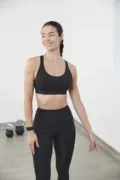Tombo Medium Impact Core Bra TOTL371 worn by a model, photo 2